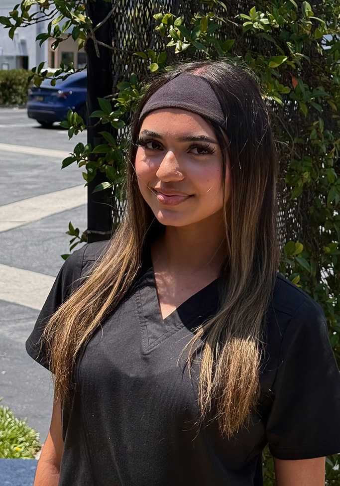 Kayleen, Brodsky Orthodontics Orthodontic Assistant, smiling portrait in Downey, CA providing Invisalign and braces care.